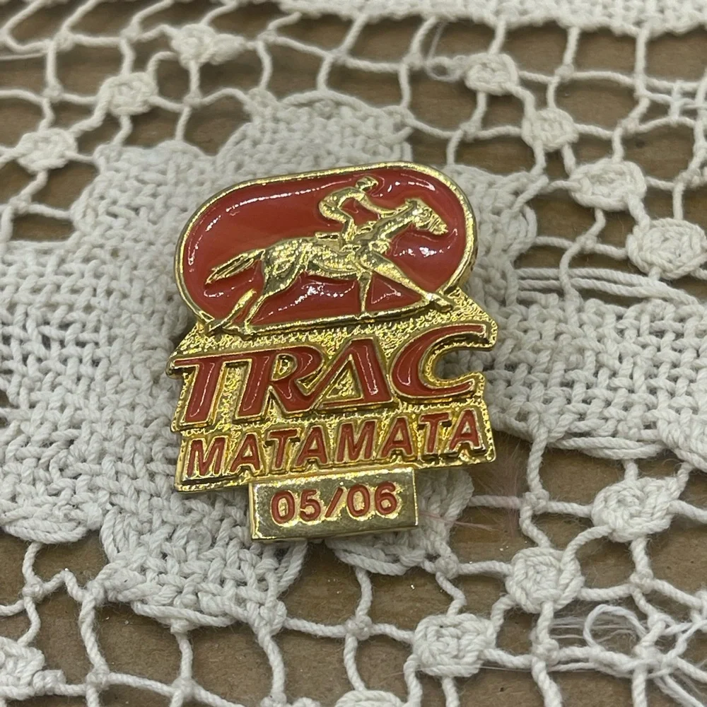 Trac Matamata Gold and Red Collector's Pin‎